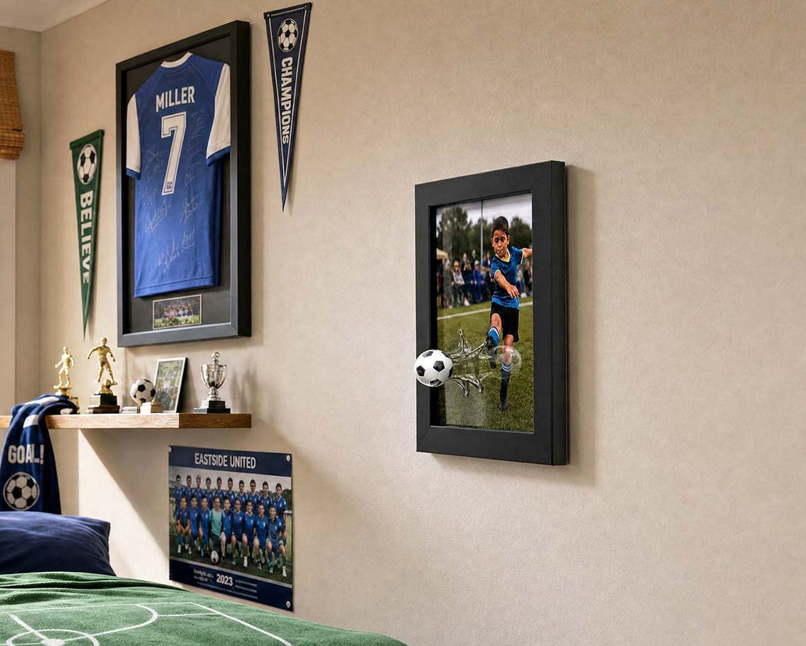BreakOut Frames black soccer ball frame hanging in a kid's bedroom